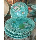 A Victorian pottery dessert set butterflies and flowers on a turquoise ground, four Victorian plates