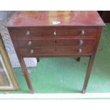 A canteen of plated cutlery in a mahogany three drawer table