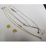 An 18ct gold fine chain 3g, two 9ct fine chains 3g, 18ct St Christopher 1.3g and a coin