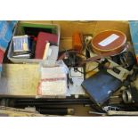 A box of miscellaneous camera items including computrol film loader