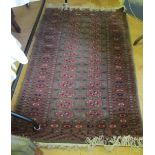 A green Bokhara rug 62” x 38”