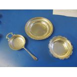 A silver sifter and dish and a silver bowl 7.3 ozs