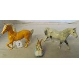A Royal Doulton horse Welsh pony, another Palomino and a Beswick Mrs Rabbit and Bunnies