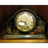 A 1920s lacquer chinoiserie clock