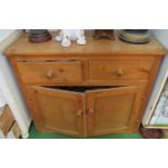 A pine sideboard two short drawers and cupboard 42”w