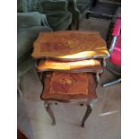 A nest of three French style occasional tables 24.5”w