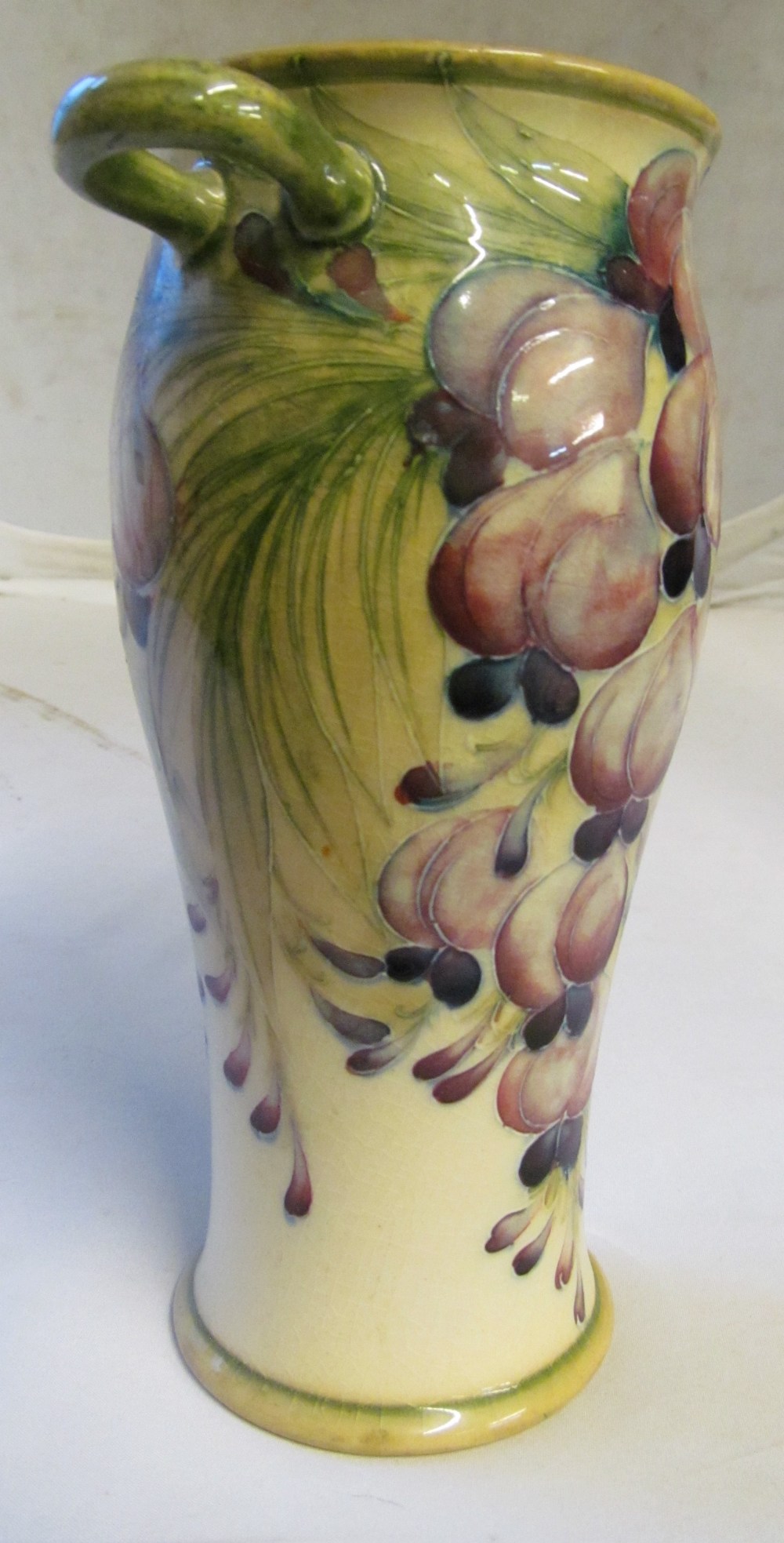 A William Moorcroft for James McIntyre ‘Wisteria’ pattern twin handled baluster shaped vase, - Image 6 of 16