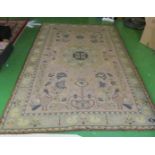 An Arts and Crafts style woven carpet central motif with birds surrounded by further birds and