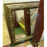 A large gilt framed mirror with carved frame 39” x 43” frame