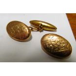 A pair of 9ct gold cufflinks (one incomplete)