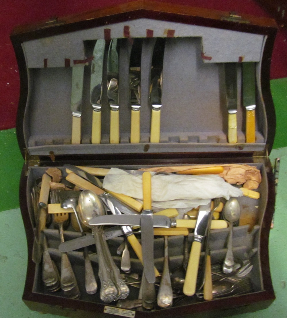 Various plated cutlery, a Gladwin Ltd mahogany canteen box and a plated chamber stick