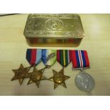 A group of WWII medals for Frederick Chapman:- 1939-45 Star, Atlantic Star, Pacific Star and War