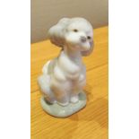 A small Lladro Society dog