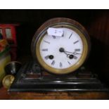 A 19th Century circular dial mantle clock