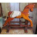 A small wooden rocking horse
