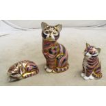 Three Royal Crown Derby cats