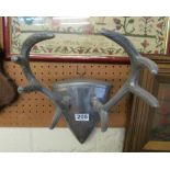 A wall mounting metal stag horn