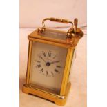 A gilt brass carriage clock retailed Aspreys