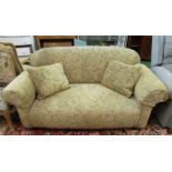 A 1920's drop end settee 71” wide