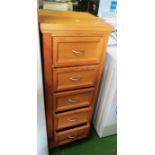 A modern narrow pine chest of five drawers 42” x 16.25”w