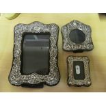 Three silver photo frames