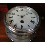 A chrome cased ships clock