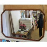 A walnut framed mirror