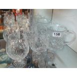 Two pairs of cut glass brandy glasses and a pair of pint beer mugs