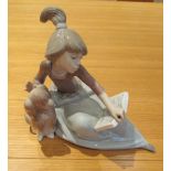 A Lladro figure A Lesson Shared No 5475 retired 1997 modelled by Juan Huerta
