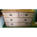 A Victorian pine chest two short and two long drawers with military style handles 50”w x 32.5”h x