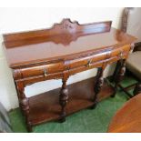 A 1930's carved oak dining suite comprising drawleaf table on heavy bulbous legs carved grape