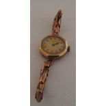 A gold ladies watch