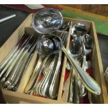 A twelve place setting set of plated cutlery with gilt edges (one fork deficient)