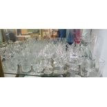 Various drinking glasses including eight brandy balloons