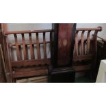 A double sleigh bed with slats