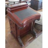 A Victorian mahogany davenport with pen box top, writing slope opening to reveal a satin walnut