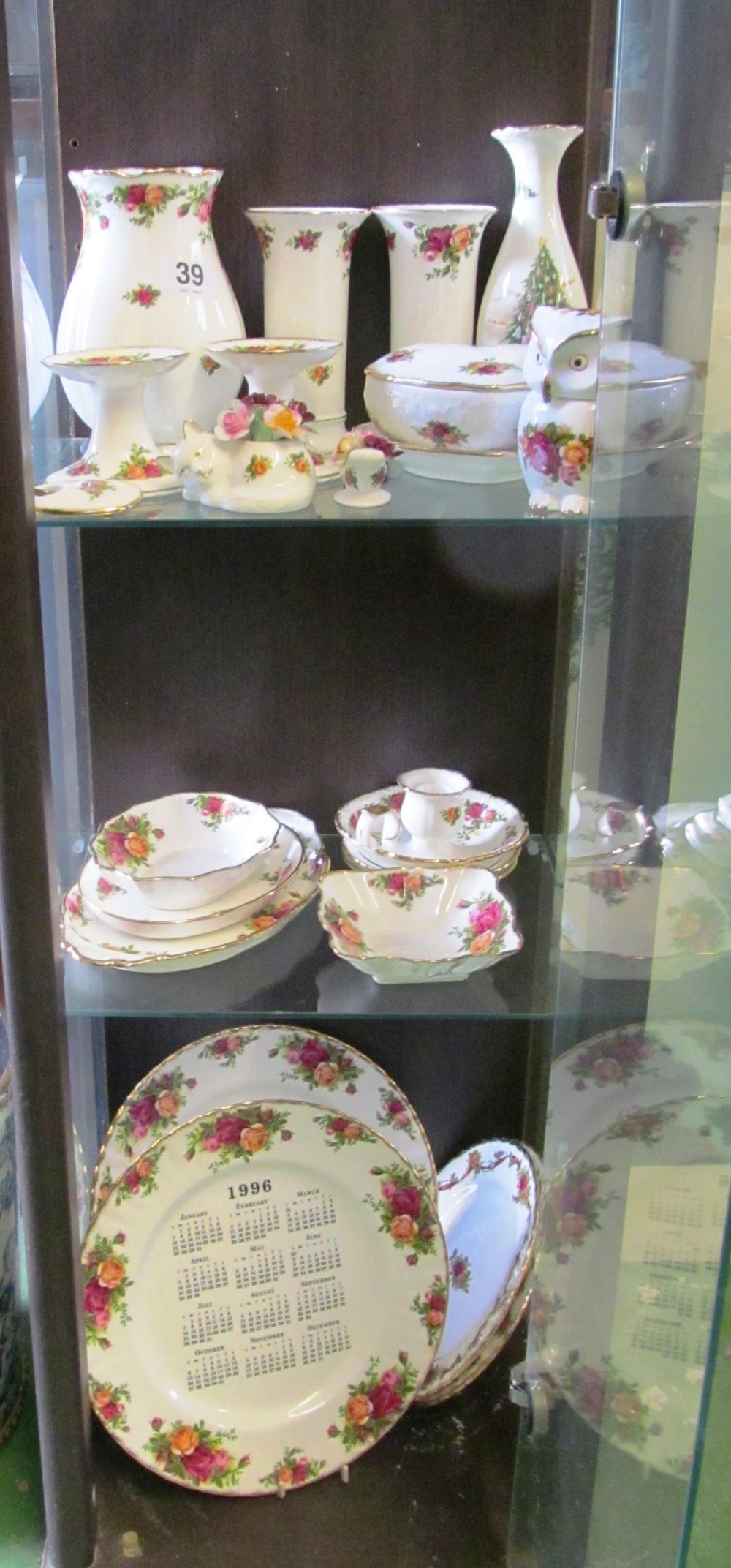 Various Royal Albert Old Country Roses vases, dishes and ornaments, two Calender plates and two