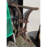 A pair of cast iron table supports, pair of French style metal jardineres and a concrete garden pot
