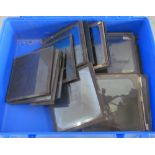 A blue case of lantern slides ships and people, and a box of old London slides