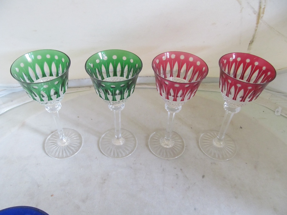 Eight coloured wine glasses