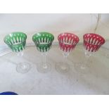Eight coloured wine glasses