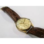 An Omega 9ct gold watch on leather strap (i.c)