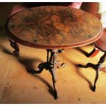 A Victorian walnut and inlaid oval occasional table on column and tripod legs (top a/f)