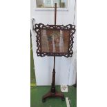 A 19th Century rosewood pole screen with tapestry inset