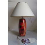Sylvie Montangnon - a pair of art glass lamps entitled 'Lampe Tango' mottled red and orange design