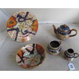 A 19th Century english Imari bowl and plate and a Royal Doulton teapot, sugar bowl and jug with