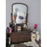 A small antique dressing table mirror with drawers