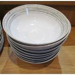 A Next Glisten dinner set:- six dinner plates, six side plates and six bowls