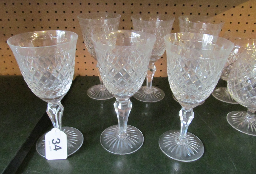 Six cut glass brandy glasses and six wine glasses