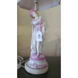 A late 19th Century figure of a gallant in pink and white clothing (a/f) converted to a lamp